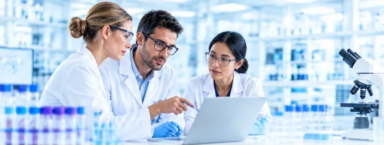 Research team reviewing data in a laboratory